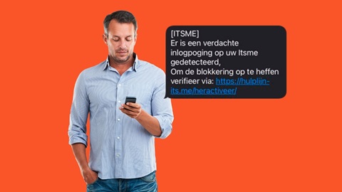 Een man krijgt een phishingbericht op zijn smartphone.
